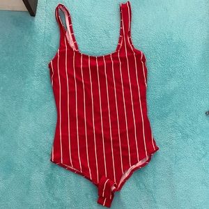 Red and white striped body suit